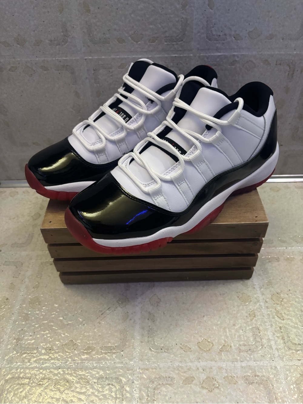 Jordan Air Jordan 11 Retro Low GS in White, Black & Red